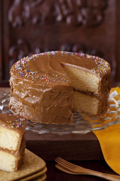 Belizean Caramel Cake, or 'Boil Milk Cake', is a light and moist white cake that's perfectly sweetened to celebrate any occasion! With a traditional white ca Milk Cake Recipe, Carmel Cake, Belize Food, Moist White Cake, Caramel Cake Recipe, Carribean Food, White Cake Recipe, Pound Cake Recipe, Light Cakes