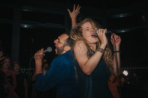 Man and women singing karaoke at a wedding. Picture by Matt Badenoch Karaoke At Wedding, Karaoke Reference Pose, Karaoke Photoshoot, Couple Karaoke, Karaoke Photography, Wedding Karaoke, Karaoke Wedding, Couple Singing, October Elopement