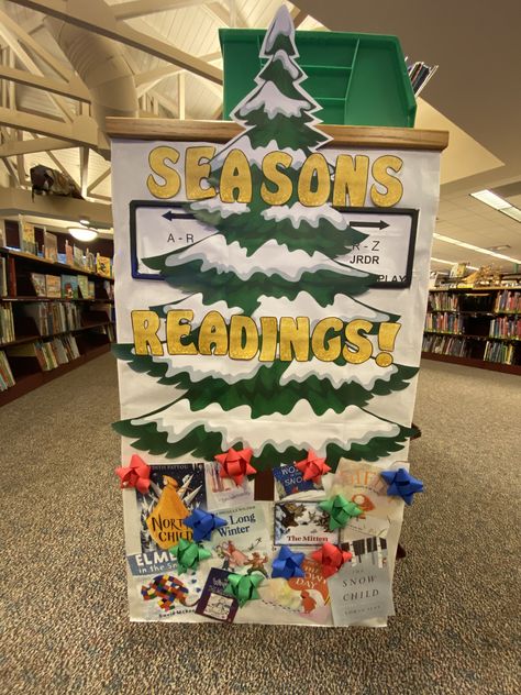 Sessions readings. Children’s end cap display. Winter book display. Library book displays. Christmas book display. Children’s books. Present. Tree. Library end cap. Christmas Book Fair Ideas, Christmas Display Library, Winter Holiday Library Displays, Library Tree Display, Winter Library Book Displays, Winter Library Display Ideas, Library End Cap Displays, Christmas Book Display Library, Library Christmas Display