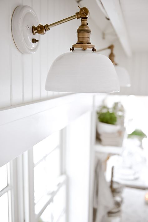 Light Above Floating Shelves Kitchen, Shabby Chic Bathroom Lighting, Lowes Pedestal Sink, Kitchen Lightening Light Fixtures, Cottage Dining Room Lighting, Cottage Lighting Ideas, Over The Kitchen Sink Lighting, Kitchen Wall Sconces, Beadboard Hallway