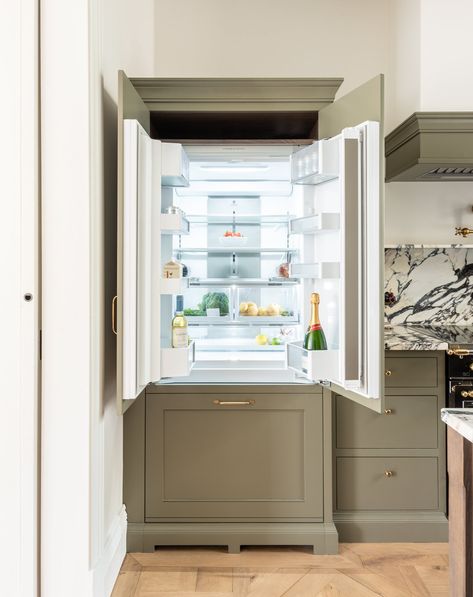 Green kitchen integrated fridge in Earl's Court designed by Herringbone Integrated Fridge Kitchen, Where To Put Fridge In Kitchen, Hidden Fridge Kitchen, Double Fridge Kitchen, Fridge In Kitchen, Hidden Fridge, Cape Cod Kitchen, Fridge Kitchen, Wooden Island