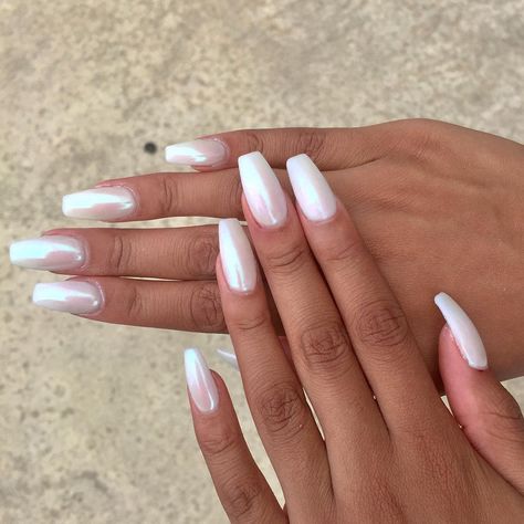 Celebrities like Selena Gomez, Jennifer Lopez, and Rihanna have worn the pearly white nail polish trend. White Chrome Nails, Nail Appointment, Nagellack Trends, Milky Nails, Celebrity Nails, White Acrylic Nails, Nail Polish Trends, White Nail Polish, Pearl Nails