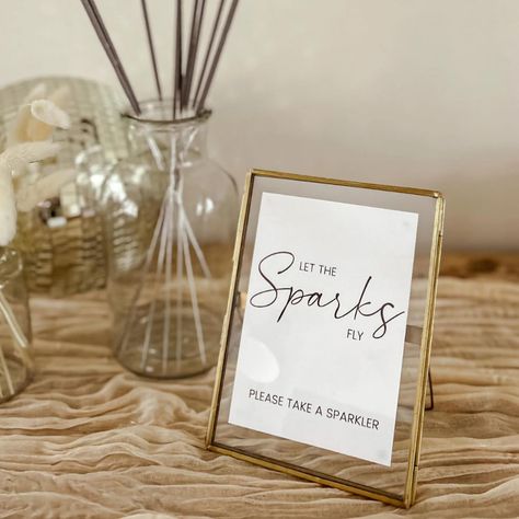 Wedding sparklers ✨ and everything you need to create a lovely display From our shop: Extra long burn time sparklers - sold in packs of 5 Jar for sparklers to be displayed in Sparkler sign #sparkler #sparklersendoff #sparklers💥 #wedding #weddingdecor #weddingideas #weddingstyling #weddingdecorations #weddingplanning #weddingtables #weddinginspiration #weddingdecor #winterweddingideas #weddingdetails #weddingplacecards #weddingcentrepieces #weddingtableideas #weddingstylist #candlehold... Wedding Sparklers Display, Sparklers Wedding Sign, Wedding Memory Table Sign, Sparklers Wedding, Sparkler Sign, Sparkler Exit Wedding, Memory Table Wedding, Brass Frames, Wedding Print