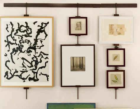 artwork hanging system - like this better than flexible wires that let paintings tip out - this would keep them straight. Gallery Wall Hanging System, Hanging Multiple Pictures, Art Hanging System, Graffiti Ideas, Gallery Wall Hanging, Hanging System, Hanging Picture Frames, Diy Picture Frames, Wall Hanging Diy