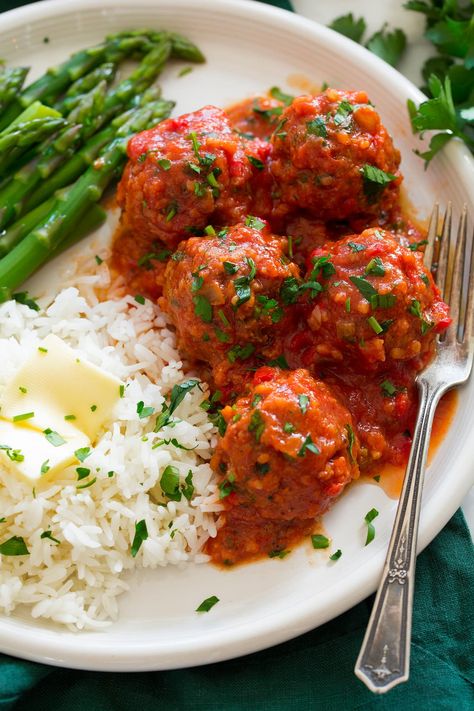 Porcupine Meatballs - They are meatballs made with ground beef, rice, onion, and bell pepper that's cooked in a simple tomato sauce mixture. A classic favorite from my childhood and one of the tastiest comfort foods! Recipe on cookingclassy.com. Bbq Meatballs And Rice, Rice With Meatballs, Meatballs Rice Recipe, Meatballs With Rice, Tastiest Recipes, Meatballs With Tomato Sauce, English Dinner, Porcupine Meatballs Recipe, Meaty Meals