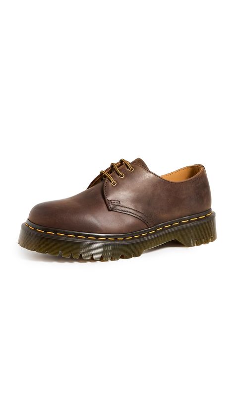 PRICES MAY VARY. The solid style of the Dr. Martens 1461 Bex shoe lets you dress them up or dress them down to match your everyday style. Crazy Horse is a heavyweight leather with a tough, textured appearance — designed to look worn in from the first step Includes classic Doc's DNA like yellow welt stitching, three eyelets, and a grooved air-cushioned sole. Traditional lace-up closure with sturdy fabric laces and metal eyelets for a secure fit. Goodyear welt construction where the upper and sole Doc Marten Bex Oxford Outfit, Crazy Horse Doc Martens Outfit, Brown Doc Martens Outfit, Brown Docs, Dr Martens Bex, Doc Martens Oxfords, Brown Doc Martens, Dr Martens Oxford, Oxfords Outfit