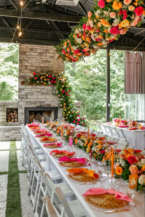 Florals created by @wildbloom.eventco! Vibrant Wedding Decor, Sunset Themed Wedding, Summer Wedding Color Schemes, Sunset Wedding Theme, Sunset Wedding Colors, Colorful Summer Wedding, Orange And Pink Wedding, Deco Orange, Indoor Wedding Receptions