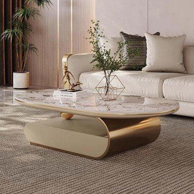 Designed for those who seek unique aesthetics, this coffee table is not just furniture but an artistic showcase. Every curve is a masterpiece of design, and every detail reflects profound aesthetic consideration. With noble sintered stone and a distinctive elliptical design, your living space transforms into a personal art gallery. The concealed storage space not only adds convenience but also offers a unique living experience. Choose this coffee table to turn your home into a refined expression Centre Table Design, Pedestal Coffee Table, Double Drawer, Luxury Coffee Table, Stone Coffee Table, Star Banner, Living Room Organization, Nesting Coffee Tables, Sintered Stone