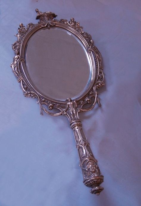 Silver Hand Mirror Aesthetic, Fancy Objects Aesthetic, Hand Held Mirror Aesthetic, Ancient Mirror Aesthetic, Vintage Hand Mirror Aesthetic, Pretty Hand Mirror, Handheld Mirror Aesthetic, Victorian Era Objects, Fancy Hand Mirror