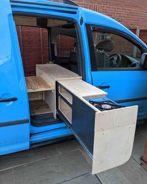 Pull out campervan kitchen with cooker and drawer storage. Made from birch plywood Ford Transit Connect Camper, Transit Connect Camper, Camper Van Kitchen, Small Camper Vans, Caddy Camper, Vw Caddy Maxi, Van Kitchen, Kangoo Camper, Minivan Camper Conversion