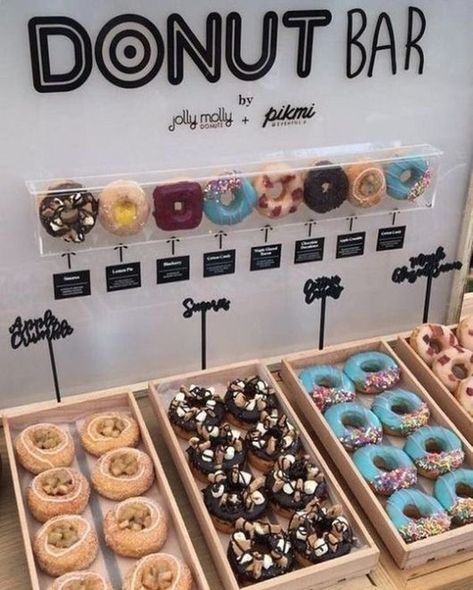 A Sophisticated Donut Display, Super Easy to Set Up! Do you Fancy one at your Event?. It's a great way to Demonstrate  your Edible goodies at an Event but also great for a Celebration 🎉 🥳 ⁠ ⁠ #Cocktail #Mocktails #Drinkstation #BarService #Wedding #Party #Birthdays #2020 #Bar #babyshower #bridalshowers #cocktailcompany #cocktails #mocktail #alcohol #parties #confectionaryservices #sweettables Doughnut Bar, Donut Walls, Party Food Bars, Dessert Display Wedding, Party Food Bar, Donut Display, Brunch Bar, Graduation Party Foods, Diy Donuts