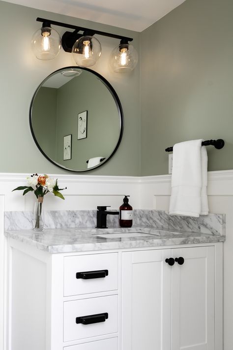 Sage Bathroom Ideas Paint, Green And White Powder Room, Studio Green Bathroom, Light Green Restroom Ideas, Sage Green Restroom Decor, Powder Room Sage Green, Bathroom Remodel Green Walls, White Paneling Bathroom, Sage Green Bathroom With Gold Accents