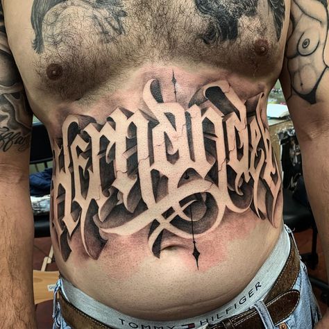 Lower Ab Tattoo For Men, Head Lettering Tattoo, Stomach Tattoos Lettering, Stomach Lettering Tattoos Men, Self Made Tattoo Lettering, Money Scripting, Chest Tattoo Fonts, Tattoo Nombres, Self Made Tattoo