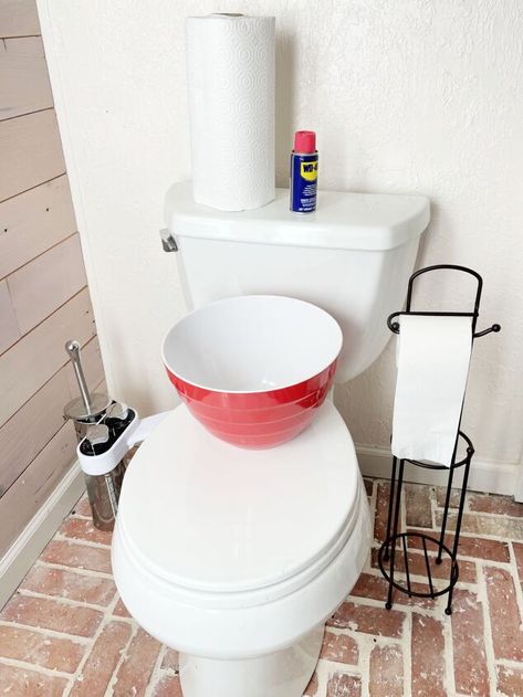 You can use WD-40 to break down tough lime stains or hard water lines in your toilet bowl.ContentsGot hard water stains or a ring in your toilet bowl? Try WD-40 to remove it! Hard water stains are typically caused by minerals in your water. The water in some places naturally has more minerals which can lead to unsightly stains in your bathroom and plumbing components. Because WD is a lubricant it’s not as harsh as most chemicals you use in the bathroom. That means it’s great for gett… Poo Pourri Spray, Clean Toilets, Cleaning Toilets, Cleaning Bathrooms, Diy Furniture Makeover Ideas, Clean Toilet, Rusty Garden, Fake Snow, Hard Water Stains