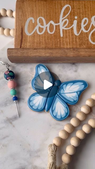 1,619 likes, 35 comments - _emmas__sweets on April 6, 2024: "Decorating using a wet on wet technique can be super easy. Just make sure all of your bag tips are cut and colours are lined up and ready to use ! This butterfly will be a perfect addition to your Mother’s Day cookie sets 💙 Featured colour: Navy Blue Fondust 💙 Cookie cutter: Butterfly 2 Scribe tool: Perfect Papaya (You can find these products on our website) Let me know if you like this colour combo for this butterfly cookie 🦋 T Blue Butterfly Cookies, Butterfly Iced Cookies, Butterfly Cutout Cookies, Butterfly Decorated Cookies, Butterfly Royal Icing Cookies, Butterfly Sugar Cookies Decorated, Butterfly Birthday Cookies, Butterfly Cookies Decorated, Butterfly Sugar Cookies