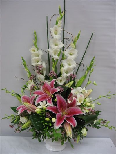 Simple Stargazer Lily Flower Arrangements | SY51 - Lilies And Glads Lily Purple, Ginger Lily, Tropical Floral Arrangements, Red Ginger, Spring Flower Arrangements, Altar Flowers, Large Flower Arrangements, Church Flower Arrangements, Creative Flower Arrangements