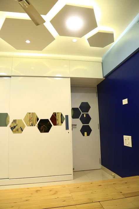 Hexagonal Shaped POP False Ceiling complementing the theme of a Bedroom with Recessed & Cove Lighting - GharPedia Small 1 Story House, Hexagonal House, Pop False Ceiling, Bedroom Pop Design, Hidden Lighting, Bed Headboard Design, Pop False Ceiling Design, Cove Lighting, Bedroom False Ceiling Design