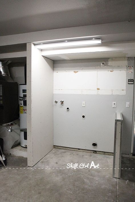 Laundry nook in garage make-over - chevron wall Diy Garage Laundry Area, Laundry Area In Garage Ideas, Build Laundry Room In Garage, Laundry Nook In Garage, Small Laundry In Garage, Small Garage Laundry Area, Bathroom In Garage, Garage Laundry Area Makeover, Laundry In Garage Makeover