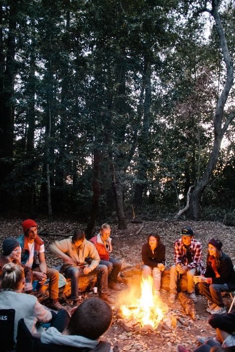 Everyone loves campfires! This lighting is impossible though - do people really do campfires during the day? All our campfire pics are terrible lighting. Sitting Around A Campfire, Lev Livet, Retro Camping, A Group Of People, Sleepover Activities, Three Rivers, Foto Vintage, Group Of People, Foto Inspiration