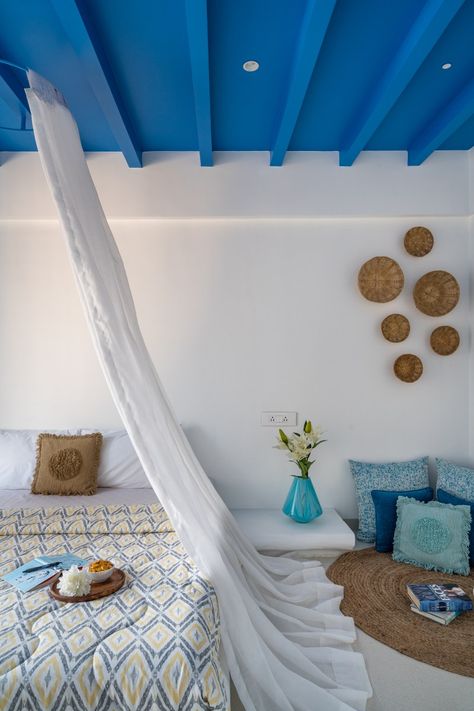 Santorini Style Themed Penthouse Interior In Pune | Between Walls - The Architects Diary Greek Inspired Home Exterior, Greek Mediterranean Decor, Santorini Bedroom Ideas, Greek Beach House Interiors, Santorini Inspired Bedroom, Greek Bedroom Decor, Greek Home Interior, Greek Style Home Interiors, Greek House Design