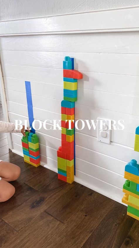 BLOCK TOWERS! Who doesn’t love a challenge?? All you have to do is throw some painter’s tape up on a wall to mark how tall each tower needs to be and give your child some legos. Want to up the challenge? Give them blocks that don’t link together! It’s been raining here all week, so this activity has been a fun one for Roo to do over and over…every time Mo knocks the towers down. 😅 #indooractivities #activitiesfortoddlers #preschoolactivities #finemotoractivity #momblogger #momming #momminai Block Activity For Preschoolers, Preschool Stem Building Activities, Building Towers Preschool, Height Activities For Preschool, How Tall Are You, How Tall Am I Preschool, Highscope Preschool Ideas, Block Activities For Preschoolers, Preschool Camping Activities