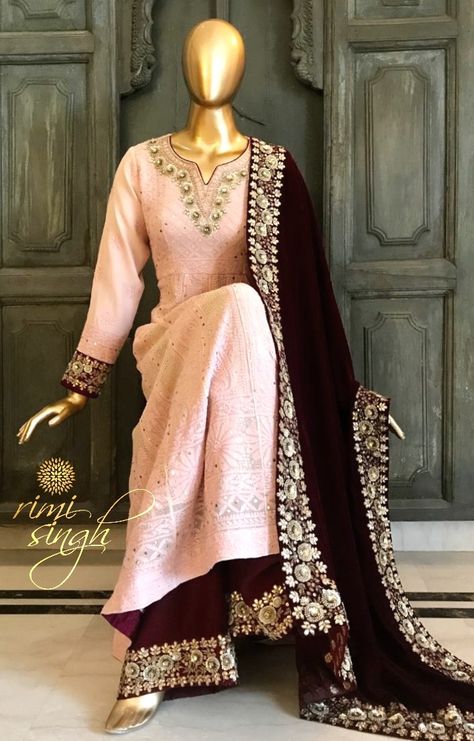 "Happiness lies in the joy of achievement and the thrill of creative effort."  Blush pink pure georgette anarkali with chikenkari and mukaish work teamed with a maroon cotton silk palazzo, a matching georgette dupatta and a maroon velvet dupatta. There is zardosi hand embroidery on the neckline, sleeves , palazzo ghera and four sides of the dupatta.  Available exclusively at  Rimi Singh Studio A 999 Sushant Lok 1  Gurgaon  #9818310054. Georgette Plazo Suit Design, Velvet Dupatta Suits, Suit With Velvet Dupatta, Velvet Dupatta, Mukaish Work, Sewing Patterns For Women, Georgette Anarkali, Trendy Embroidery, Velvet Dress Designs