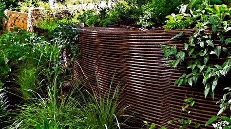 Rebar edging, Garden in Inverleith, Edinburgh by Water Gems Rebar Fence, Retaining Wall Fence, Water Gems, Fencing Companies, Aluminum Fence, Iron Fence, Fence Gate, Fence Design, Environmental Graphics