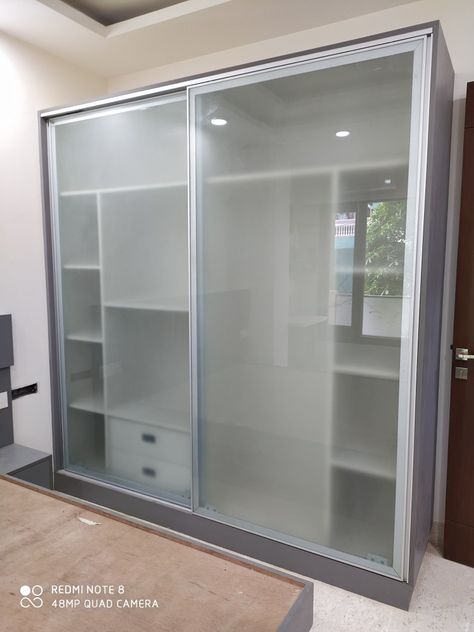 Glass sliding almirah Glass Almirah Designs, Wardrobe Inside Design Storage, Glass Almirah, Glass Sliding Wardrobe, Glass Kitchen Cabinet Doors, Closet Small Bedroom, Almirah Designs, Bedroom Cabinet, Bedroom Cupboards