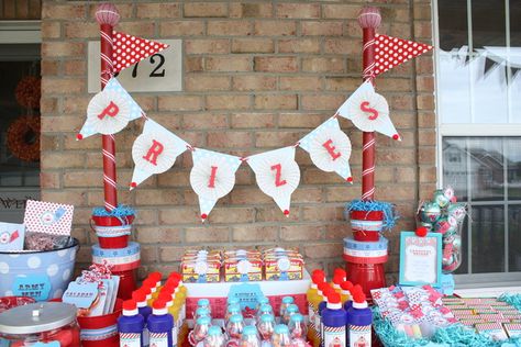 bubbles, sidewalk chalk in individual bags with toppers, animal crackers, jacks, foam balls, clown noses...what else?  LOVE that they fill their own buckets!!!!! Prize Table Display, Circus Party Favors, Carnival Birthday Party Ideas, Carnival Party Favors, Backyard Carnival, Vintage Circus Party, Carnival Birthday Party, Circus Carnival Party, Party Prizes