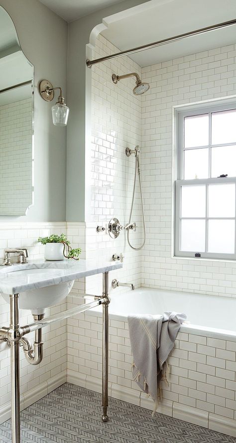 As in the master bath and powder room, the washstand in the daughter’s bathroom is by Waterworks. Tiles by Pratt & Larson line the walls, while Ann Sacks herringbone Carrara tiles cover the floor. White Subway Tile Bathroom, Makeover Kamar Mandi, Subway Tiles Bathroom, Interior Design Minimalist, 1920s House, Bad Inspiration, Small Remodel, White Subway Tile, Bathroom Redo