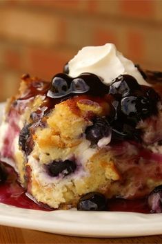 Overnight Blueberry French Toast | "Good for any holiday breakfast or brunch, it's filled with the fresh taste of blueberries, and covered with a rich blueberry sauce to make it one of a kind." #holidays #holidayrecipes #holidayseason #holidayfood #allrecipes Blueberry French Toast Casserole, Pizza Vegana, Blueberry French Toast, Breakfast And Brunch, Overnight Blueberry French Toast, Holiday Breakfast, What's For Breakfast, French Toast Casserole, French Toast Recipe