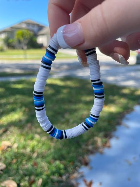 Black, white, medium blue, and light blue clay beaded bracelet Manly Clay Bead Bracelets, Clay Bead Bracelet For Boyfriend, Surfer Clay Bead Bracelets, Clay Bead Bracelet Ideas White, Men’s Clay Bead Bracelet Ideas, Light Blue Clay Bead Bracelet, Clay Bead Bracelet Ideas Patterns, Guy Clay Bead Bracelets, Teal Clay Bead Bracelet