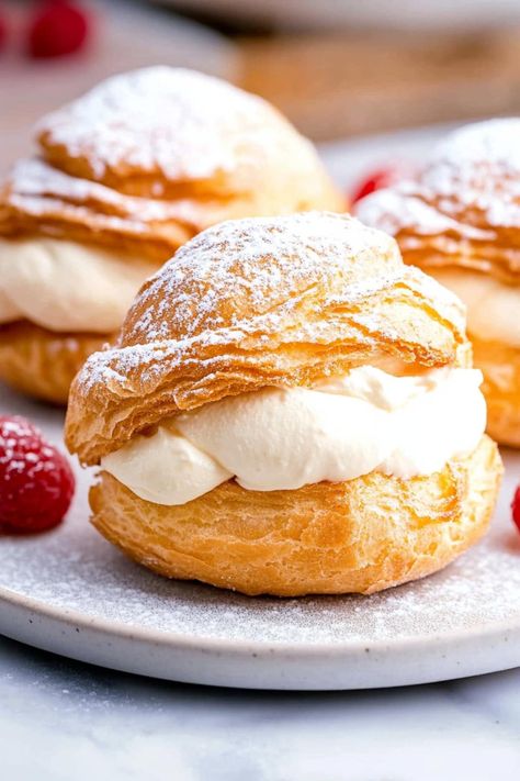 These light, airy cream puffs filled with silky pastry cream and topped with a dusting of powdered sugar are perfect for any occasion! Cream Puff Recipe Easy, Homemade Cream Puffs Recipes, Boston Cream Puffs, Sourdough Cream Puffs, Custard For Cream Puffs, Cream Filled Pastries, Creme Puffs Recipe, Cream Puffs Filling, Creme Puff Recipe