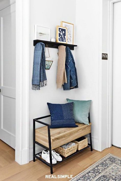 7 Clever Storage Ideas to Steal from the Real Simple Home | Calling all small-space dwellers: this is the entryway storage bench you've been waiting for. It's less than 3 feet long, has a bench for shoes and baskets, plus the top lifts up to reveal another compartment. #declutter #organizationtips #realsimple #storageideas #storagetips Entrance Furniture, Entrance Halls, Star View, Entry Ideas, Entryway Bench Storage, Front Entryway, Diy Casa, Entryway Storage, Foyer Design