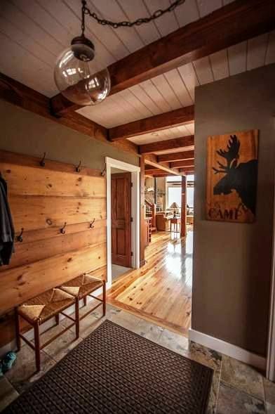 Mudroom to kitchen attached garage wall color gray warm greige A post and beam entry to a smaller mountain lodge style post and beam barn home. Post And Beam Barn Homes, Yankee Barn Homes, Cabin Living, Lodge Style, Lodge Decor, Metal Building Homes, Post And Beam, Cabin Homes, Barn Style