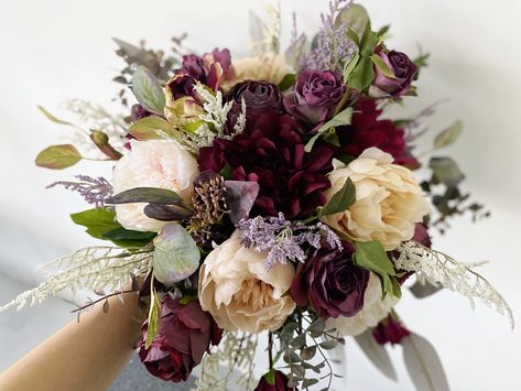 "Size about 25cm / 10\" in diameter for a bridesmaid bouquet about 40cm / 15\" in diameter for a bridal bouquet Material silk flowers, faux foliage, etc. Flowers & Foliages peony, dahlia, rose, peony, eucalyptus, etc. Colors burgundy, purple, lavender, champagne, ivory white, etc. * Please kindly note that my shop is based in China, so all the flower works in my shop will be shipped abroad. *" Purple Mauve Wedding Flowers, Eggplant Purple Wedding Bouquet, Burgundy And Purple Wedding Flowers, Purple Green Champagne Wedding, Purple Fall Bouquet Wedding, Deep Purple Wedding Flowers, Burgundy Lilac Wedding, Olive And Purple Wedding, Dahlia Peony Bouquet