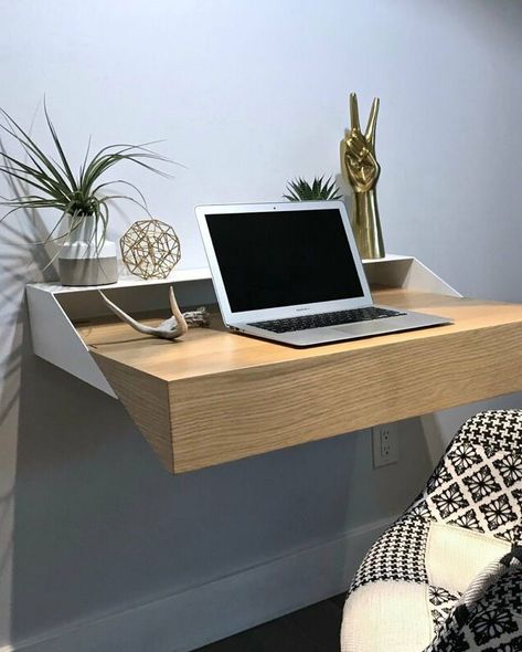 You might think your tiny apartment can't fit a home office, but with the right desk, you can turn any space into the perfect work nook. Whether you choose a narrow writing desk, a wall-mounted ladder desk, a floating table, or a corner-shaped desk, there's an option out there for your home. And as a bonus, more than half of the options on this list are under $200, too, so you can deck out your home office on a budget. #wfhsetup #smalldesks Ikea Standing Desk, Extendable Desk, Studio In Casa, Hidden Desk, Fold Out Desk, Ladder Desk, Tiny Office, Floating Table, Desks For Small Spaces