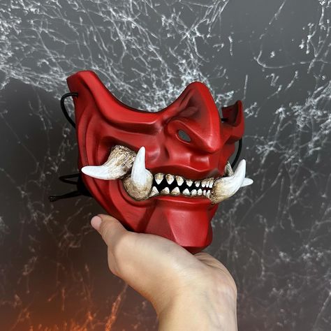 Japanese Samurai Mempo mask with big fangs: Classic Red Made to Order The mask is comfortable to wear and also suitable for hanging on the wall 🖤 Worldwide Shipping is free Text me in direct to Order If you pay by PayPal on our website I can give you additional 20% discount ☺️ , . #menpo #halfmask #samurai #samuraiarmor #warrior #samurai #oni #onimask Diy Oni Mask, Mascara Samurai, Samurai Masks, Mempo Mask, Menpo Mask, Oni Masks, Oni Maske, Mascara Oni, Japanese Demon Mask