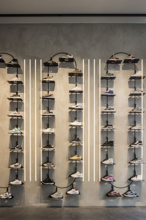 Shoe Displays Retail, Shoes On Shelves, Shoe Showroom Display, Shoes Display Retail Store Interiors, Display Shoes Store, Sneaker Shop Interior, Floating Sneaker Display, Shoe Shop Interior Design Display, Shoe Showroom Interior