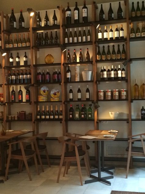 Restaurant Shelves Design, Wine Shelf Restaurant, Wood Bar Shelving, Wine Bar Decoration, Wine Shop Shelving, Cosy Wine Bar, Wine Bar Decor Restaurant, Wine And Tapas Bar, Tapas Bar Design Interiors