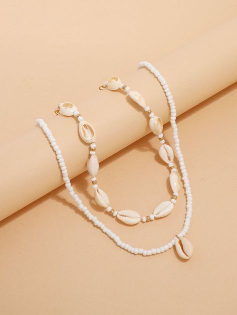 Color: White Gender: Women Material: Shell Details: Shell Style: Vacation Product Measurements in cm : Size Length one-size 41-50 Chokers Necklaces, Clay Bead Necklace, Preppy Jewelry, Shell Choker, Beaded Jewelry Necklaces, Bracelets Design, Pola Gelang, Trendy Necklace, Shell Decor