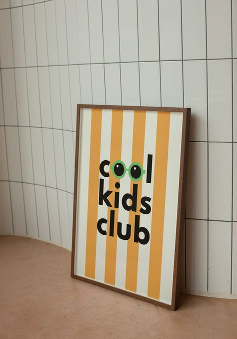 This 'Cool Kids Club' Fine Art Print is printed on premium quality 310gsm cardstock and is available in A3 and A4 (UNFRAMED). This print has been designed and printed in the UK and is printed to order to reduce wastage. There are other colour combinations available including; white, blue and yellow, white, pink and yellow and white, orange and green.  The simple and striking design will allow the print to stand out in any room. Ideal for a kid's bedroom, nursery or playroom!  A3: H420mm x W270mm A4: H297mm x W210mm All orders are shipped in a board backed envelope and NOT rolled to prevent creasing. PLEASE GET IN TOUCH FOR CUSTOM COLOUR COMBINATIONS Orange Kids Room, Yellow Kids Room, Funky Nursery, Yellow Playroom, Yellow Kids Rooms, Boy Room Poster, Loft Playroom, Toddler And Baby Room, Retro Nursery