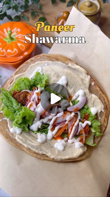 Pooja Bothra Daga on Instagram: "•STREET STYLE PANEER SHAWARMA RECIPE• Well this tastes heavenly!! A pure veg shawarma recipe which will surely win your hearts Ingredients used are- Olive oil / sarson oil 1 tbsp Ginger garlic paste- 1 Tosp Curd- 1 Cup Kashmiri red chilli powder- 2 Tbsp Red chilli powder- 1 Tbsp Cumin powder- 1 Tbsp Coriander Powder- 2 Tbsp Garam Masala- 1 Tosp Carom seeds (Ajwain) - 1 Tbsp Kasuri Methi- 1 Tbsp Lemon juice- 1 Tbsp Paneer- 400 grams Important tip- Do rest the marinated paneer for about 20 mins! Garlic Sauce - Hung curd 1/2 cup Mayonnaise 1/4 cup Garlic 1 tbsp Salt and pepper Lemon juice Blend it to smooth sauce Pita bread or laccha parantha Hummus Garlic sauce SIRACHA OR chilli sauce Lettuce Onions Chaat Masala You may add pickled veggies if you Paneer Shawarma Recipe, Garlic Shawarma Sauce, Paneer Shawarma, Veg Shawarma Recipe, Shawarma Garlic Sauce, Marinated Paneer, Paneer Butter Masala With Naan, How To Make Paneer Butter Masala, Carom Seeds