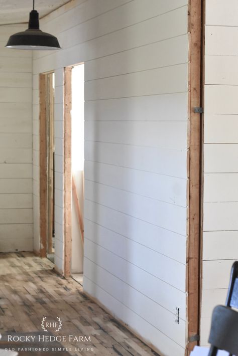 How to cover your double wide mobile home. Remove the wall strips and add shiplap boards for that rustic farmhouse look. | Questions and Answers about living in a double wide mobile home Double Wide Mobile Home Remodel, Double Wide Remodel Before And After, Mobile Home Walls, Shiplap Living Room, Double Wide Remodel, Mobile Home Bathrooms, Double Wide Home, Double Wide Mobile Home, Shiplap Boards