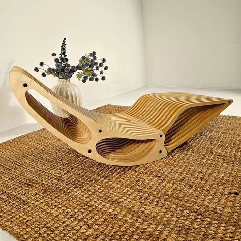 Modern futuristic sun lounger "Spaceship" helps you relax sitting by the pool in the sun. Comfortable sitting place. Made of fine birch plywood covered with natural linseed oil, that makes it 100% waterproof. Unique design helps to highlight your individuality. All our furniture is made in USA, we guarantee the quality of our furniture. Product dimensions: seat lenght - 61 inch, width - 21.5 inch, height - 17,5 inch weight - 35 pounds. #outdoorfurniture #sunlounger #chaselounger #parametric... Sitting By The Pool, Modern Futuristic, Linseed Oil, Design Help, Birch Plywood, The Pool, Sun Lounger, Spaceship, Plywood