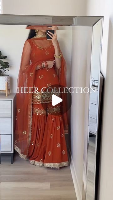 Heer Collection Inc. by Aman Gill on Instagram: "AMORE IN RUST Gharara Set// Rust Orange colored suit with full hand work front and back kameez, gharara and soft net dupatta. How to order/ inquiries: DM, text or email us. Customization: this piece can be made in any color, style or size. #indianwedding #pakistanwedding #desiwedding #kundan #polki #desibride #punjabibride #pakistanibride #desifashion #sikhbride #punjabijutti #phulkari #punjabisuit #jhumkis #punjabiwedding #indianoutfits #shararasuit #pakistanioutfits" Heer Collection Suits, Orange Sharara Suit, Indian Wedding Outfits Bridesmaid, Rust Orange Lehenga, Heer Collection, Orange Gharara, Healthy Black Hair, Sikh Bride, Pakistan Wedding