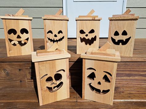 These wooden Jack O' Lanterns are made with rough sawn cedar wood for a fun rustic addition to your holiday decor. They will look great inside and outside. Each lantern comes with an LED light so that faces will glow in the night. There are six different faces available to choose from. Each lantern is made from natural cedar wood and will be unique. Wood Projects For Garden, Wooden Jack O Lantern Boxes, Wood Jack O Lantern Diy, Halloween Wooden Decorations, Halloween Wood Projects, Christmas Wood Projects, Small Wood Projects To Sell, 4x4 Wood Crafts, Wood Halloween Decorations