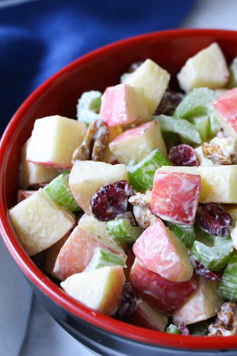 Delicious apple salad in a serving bowl made with Fuji apples, walnuts, celery and cranberries Waldorf Salad Recipe Healthy, Charlotte Recipe, Nut Salad, Waldorf Salad Recipe, Fruit Dips, Peasant Food, Apple Salad Recipes, Waldorf Salad, Mango Cheesecake