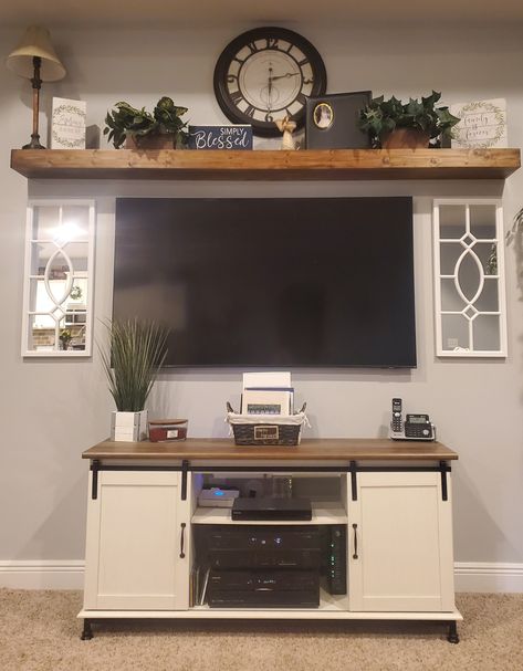 How To Decorate A Entertainment Center, What To Put Over Tv In Living Room, Decorating Top Of Entertainment Center Farmhouse, Living Room Revamp, Wall Decor By Tv On Wall, Summer Tv Stand Decor, How To Decorate Around Mounted Tv, 58 Inch Tv On Wall, How To Decorate Above Tv Living Rooms