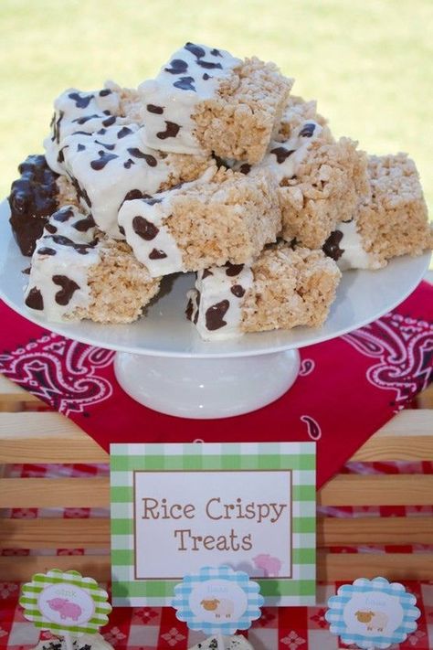 farm treat  make rice krispie square, dip end in white chocolate and then take a knife dip it in chocolate and make patches of brown on the white! Farm Theme Birthday, Farm Animal Party, Farm Animals Birthday Party, Farm Themed Birthday Party, Cowboy Birthday Party, Krispy Treats, Cowboy Baby, Barnyard Party, Cow Birthday